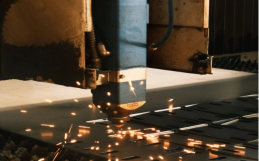 laser-cutter-cutting-slots-in-metal-sheet